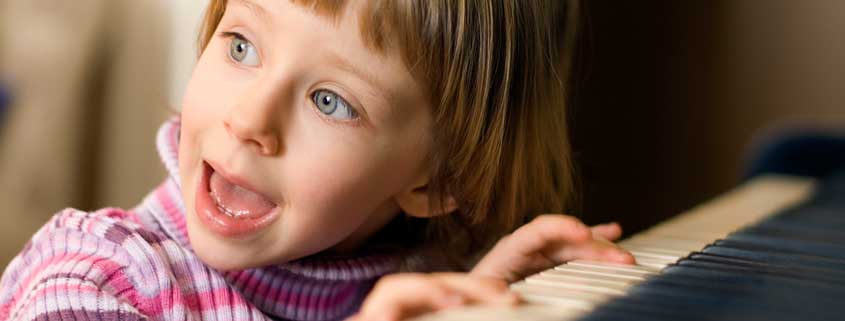 Excited-girl-at-piano---845x321jpg Excited-girl-at-piano---845x321jpg