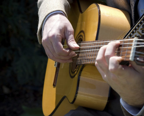 Acoustic guitar playing music