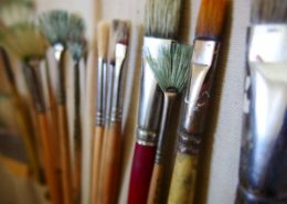 Paint Brushes against canvas - painting class