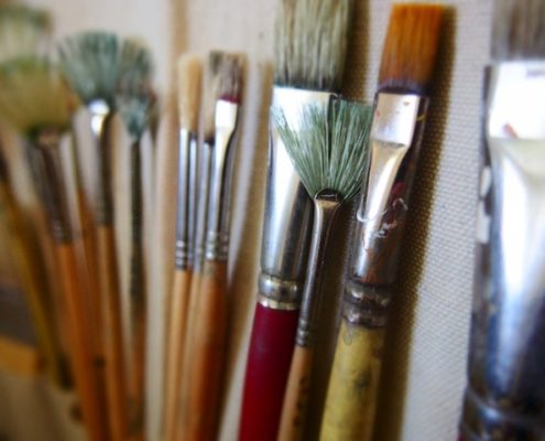 Paint Brushes against canvas - painting class