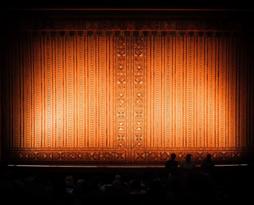 Theatre Stage Curtain with a Spotlight